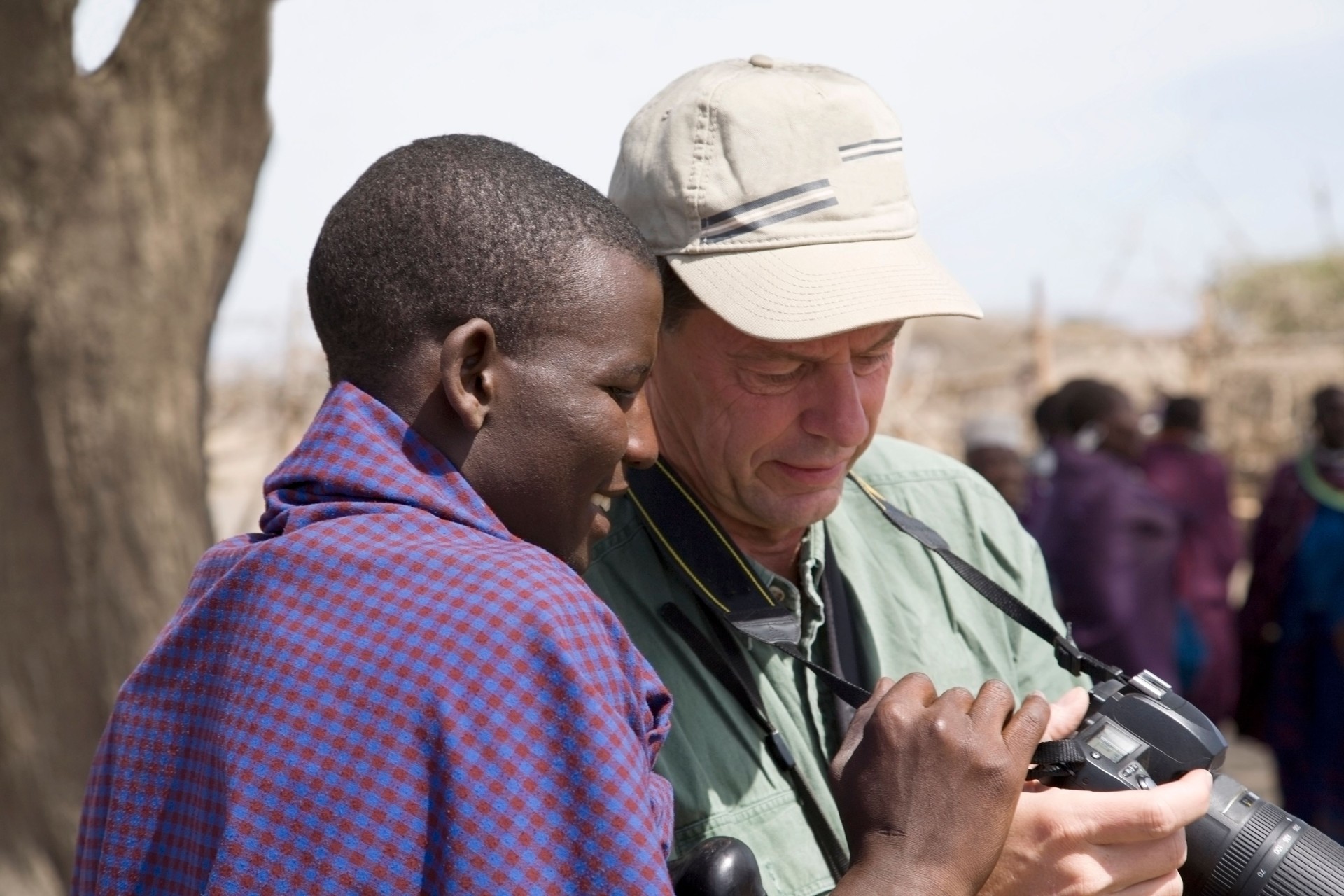 Young maasai and tourist. Young maasai and tourist.